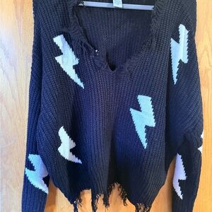 Frayed V-Neck Sweater with Lightning Bolt Design